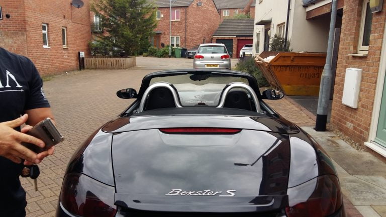 Wind deflector fitted to a Porsche Boxster 986